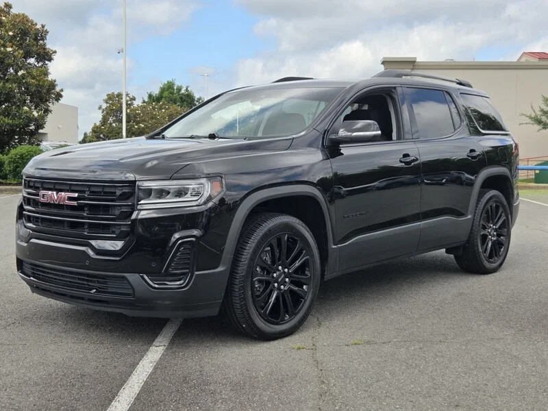 Used 2023 Ebony Twilight Metallic GMC SLE image 1