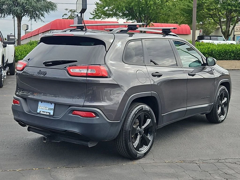 Used 2016 Granite Crystal Metallic Clearcoat Jeep Sport image 6