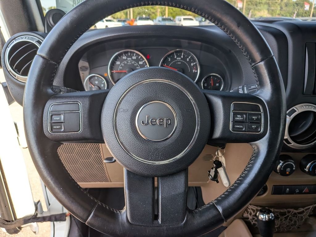 Used 2014 White Jeep Unlimited Sahara image 13