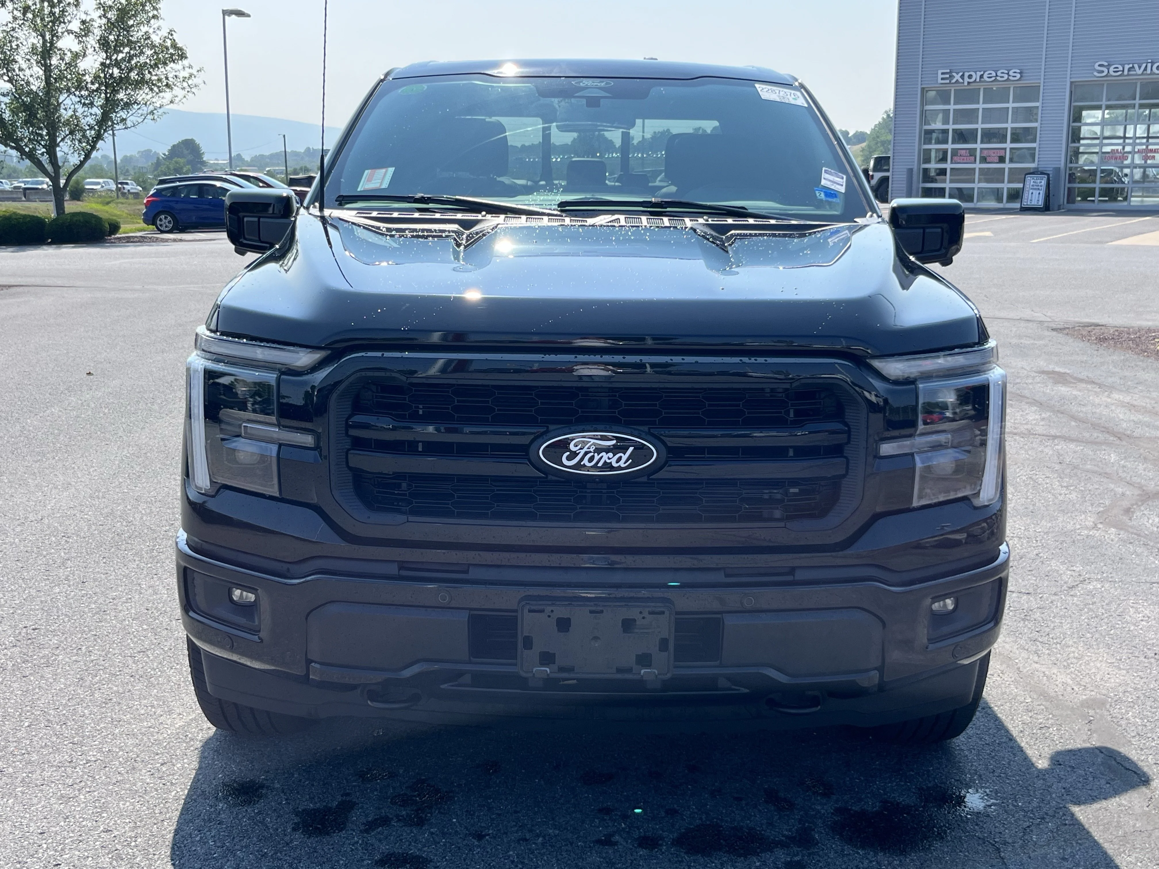 Used 2025 Black Metallic Ford Lariat image 11