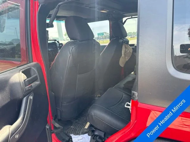 Used 2015 Firecracker Red Jeep Unlimited Sport image 14