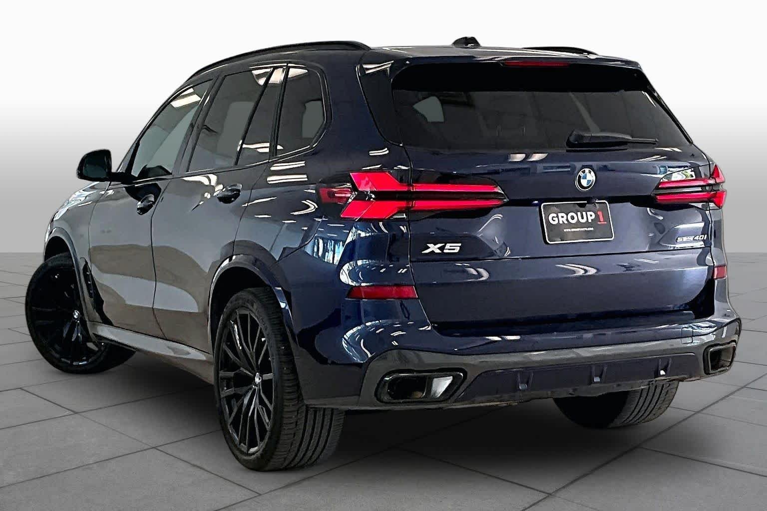 Used 2024 Tanzanite Blue II Metallic BMW sDrive40i image 11