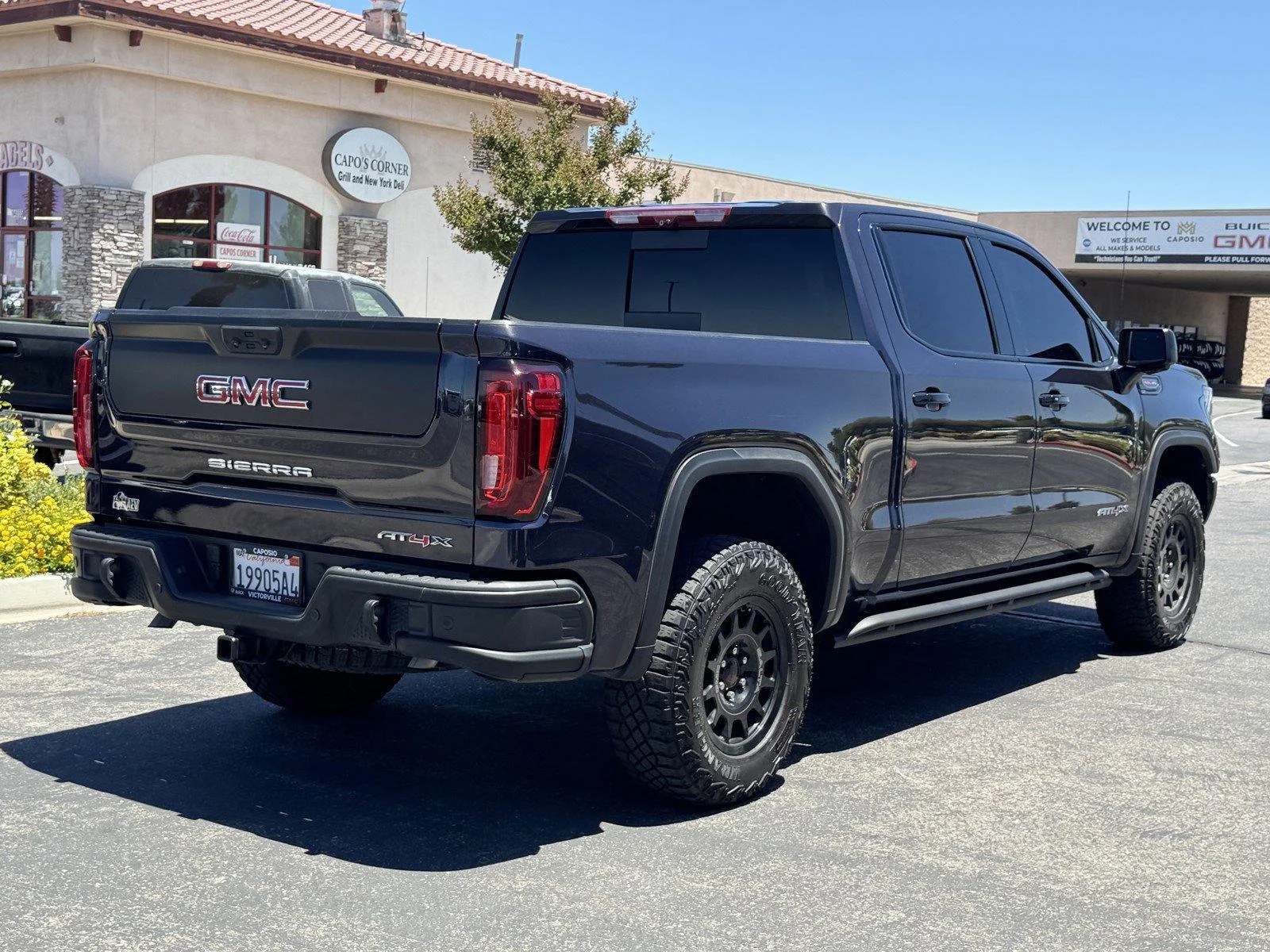 Used 2024 Titanium Rush Metallic GMC AT4X image 6