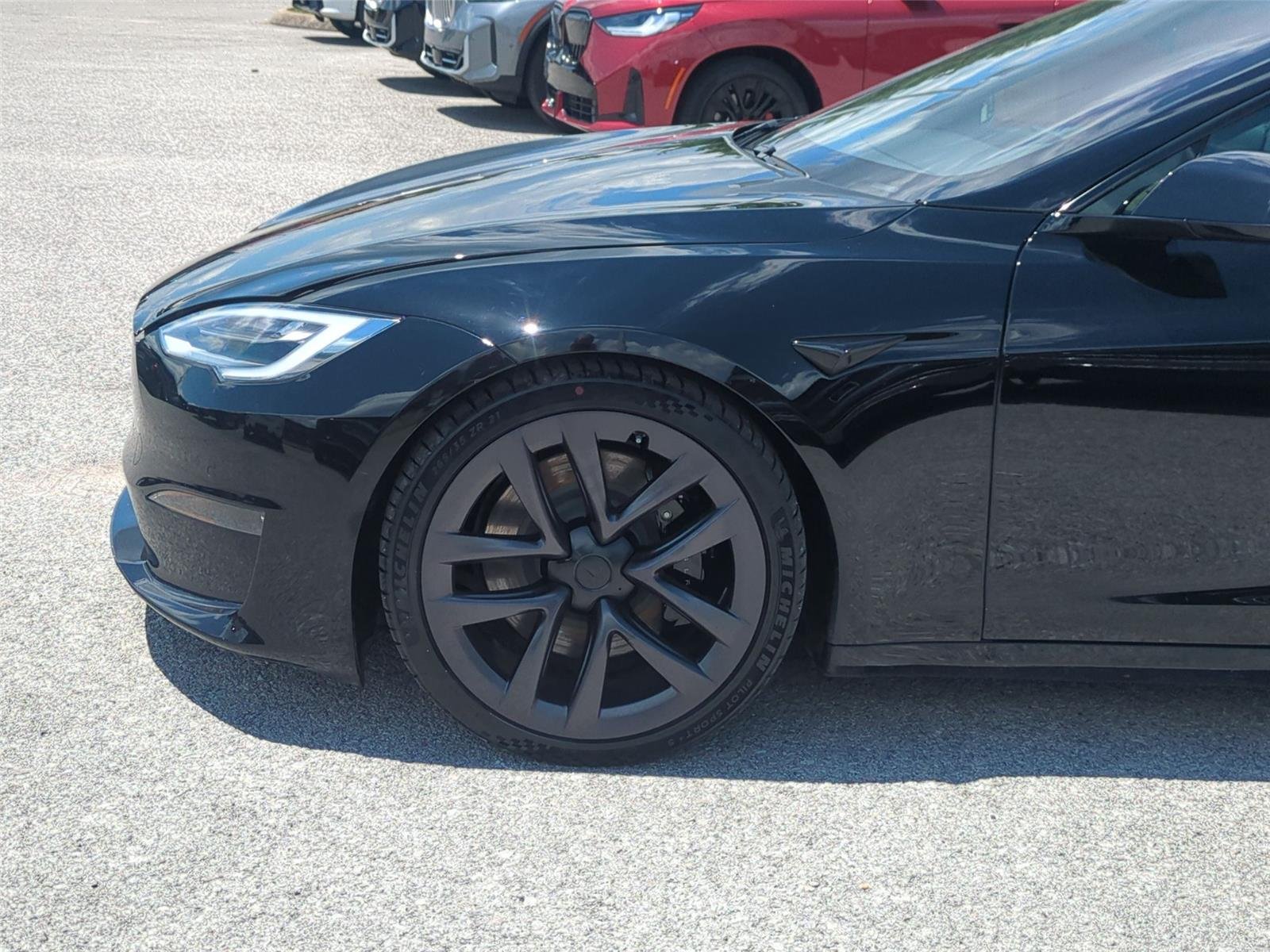 Used 2021 Solid Black Tesla Plaid image 10