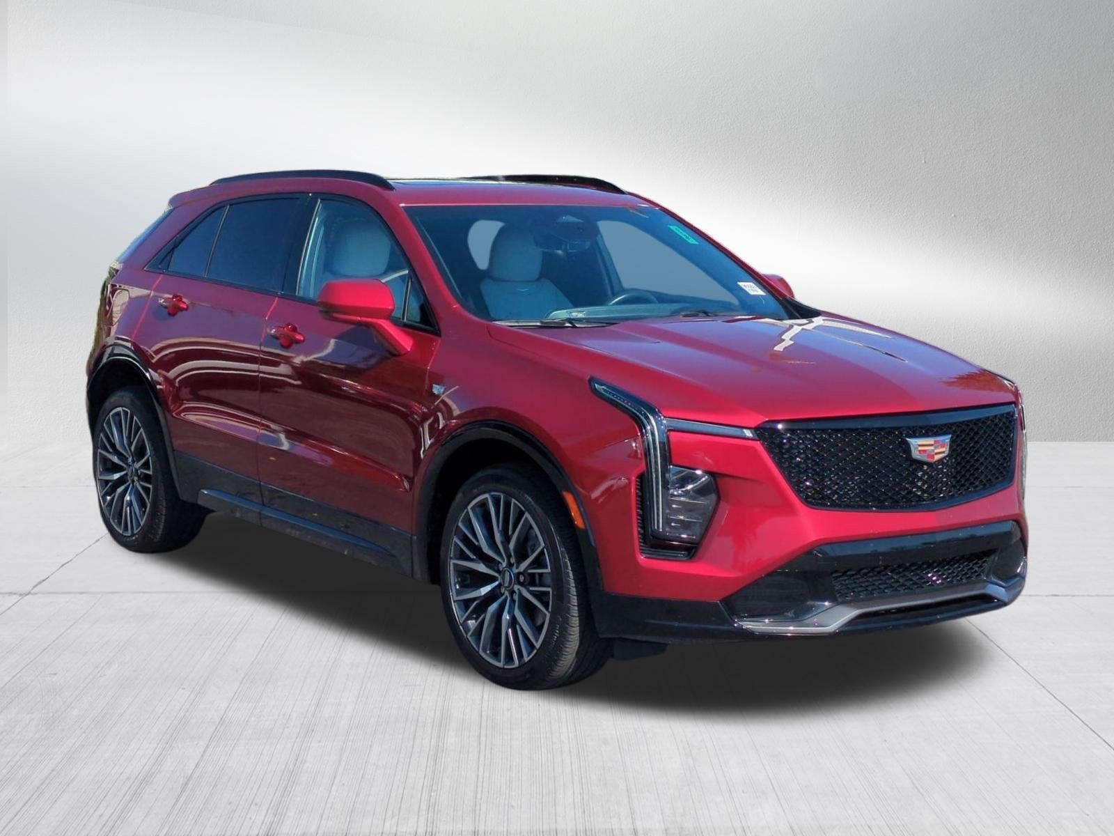 Used 2024 Radiant Red Tintcoat Cadillac Sport image 7