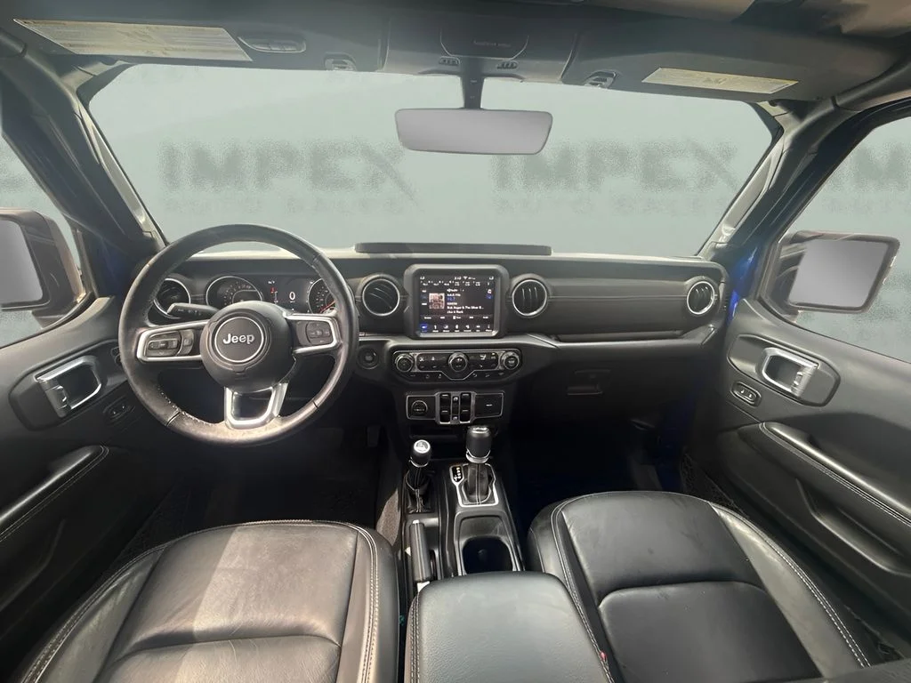 Used 2018 Blue Jeep Unlimited Sahara image 9
