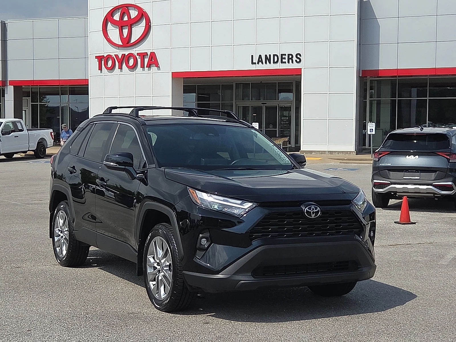 Used 2024 Midnight Black Metallic Toyota XLE Premium image 1