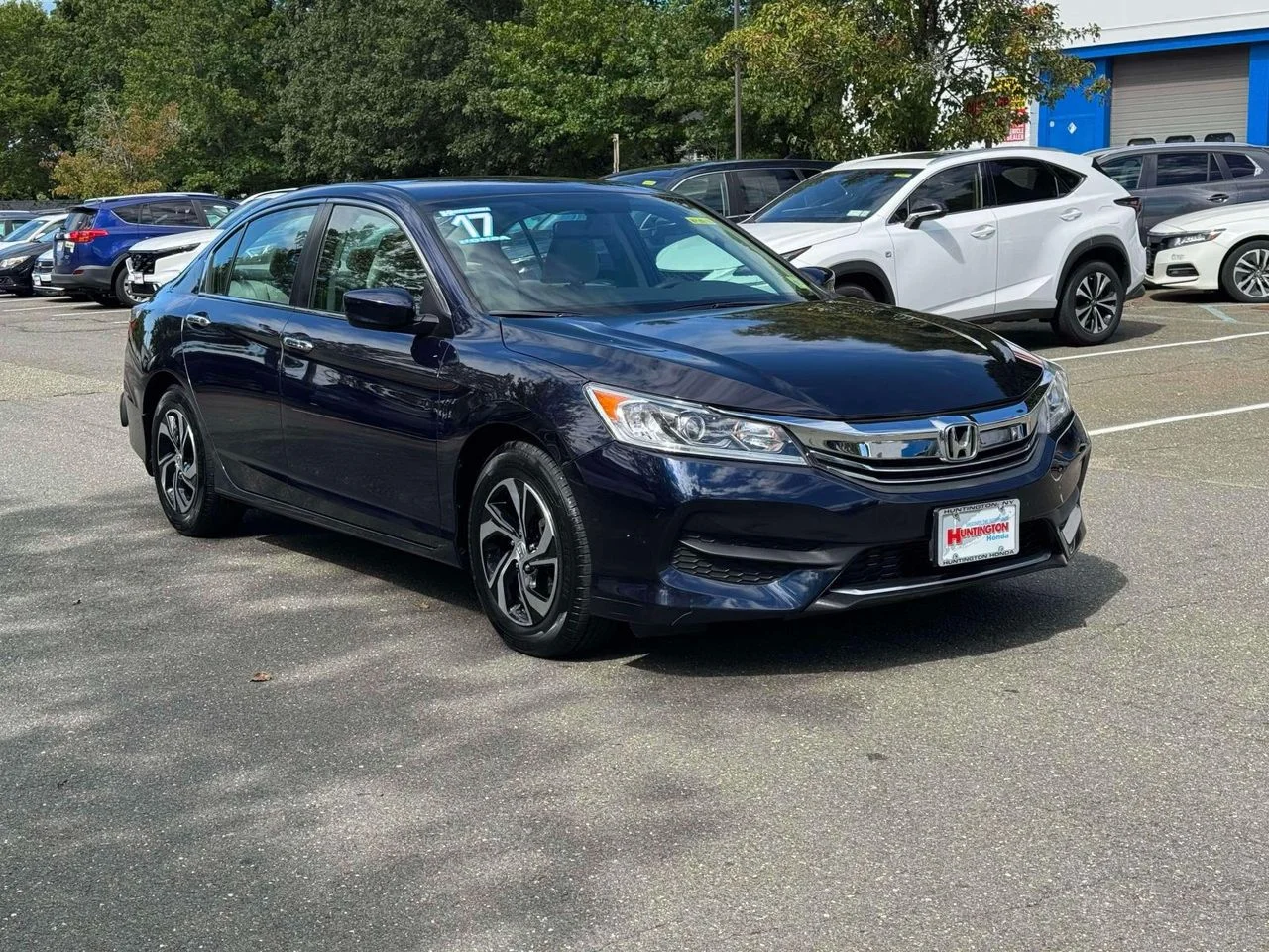 Used 2017 Deep Blue Opal Metallic Honda LX image 1
