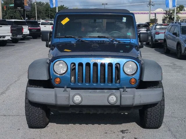 Used 2010 Blue Jeep Unlimited Sport image 2