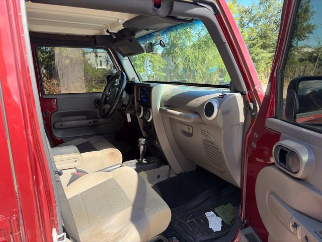 Used 2010 Red Jeep Unlimited Sahara image 11
