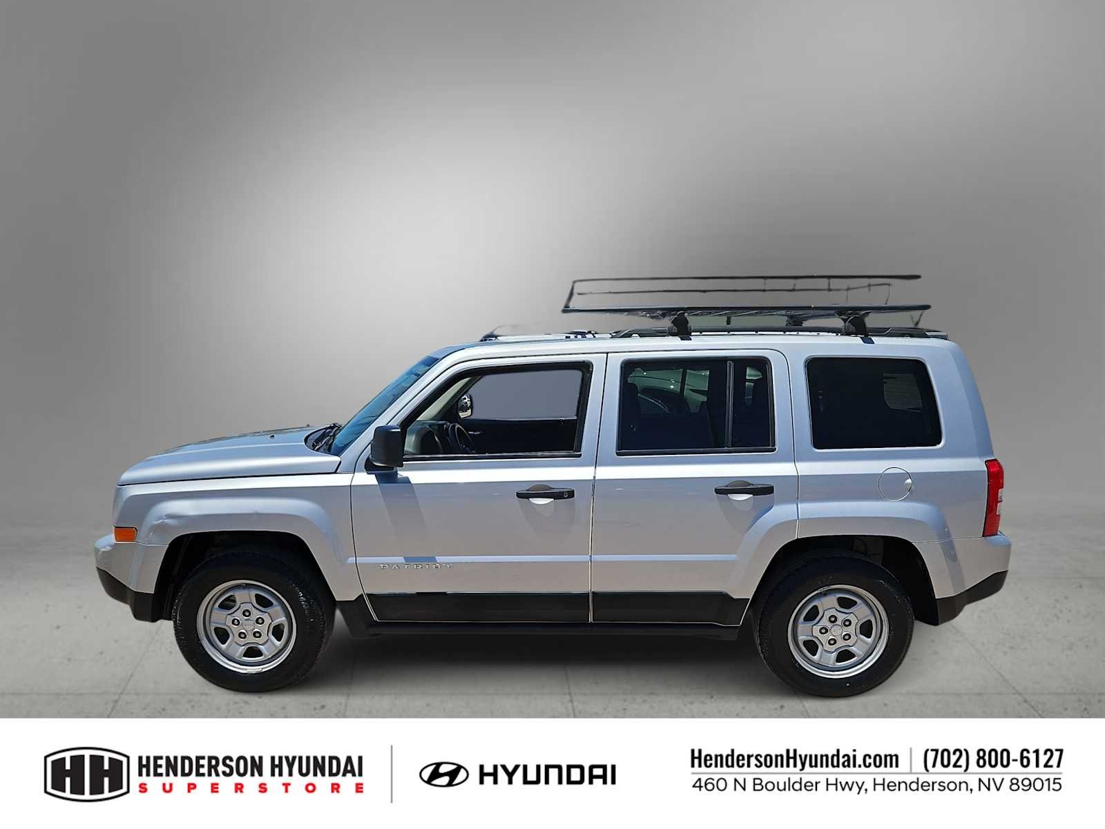 Used 2011 Bright Silver Metallic Jeep Sport image 5