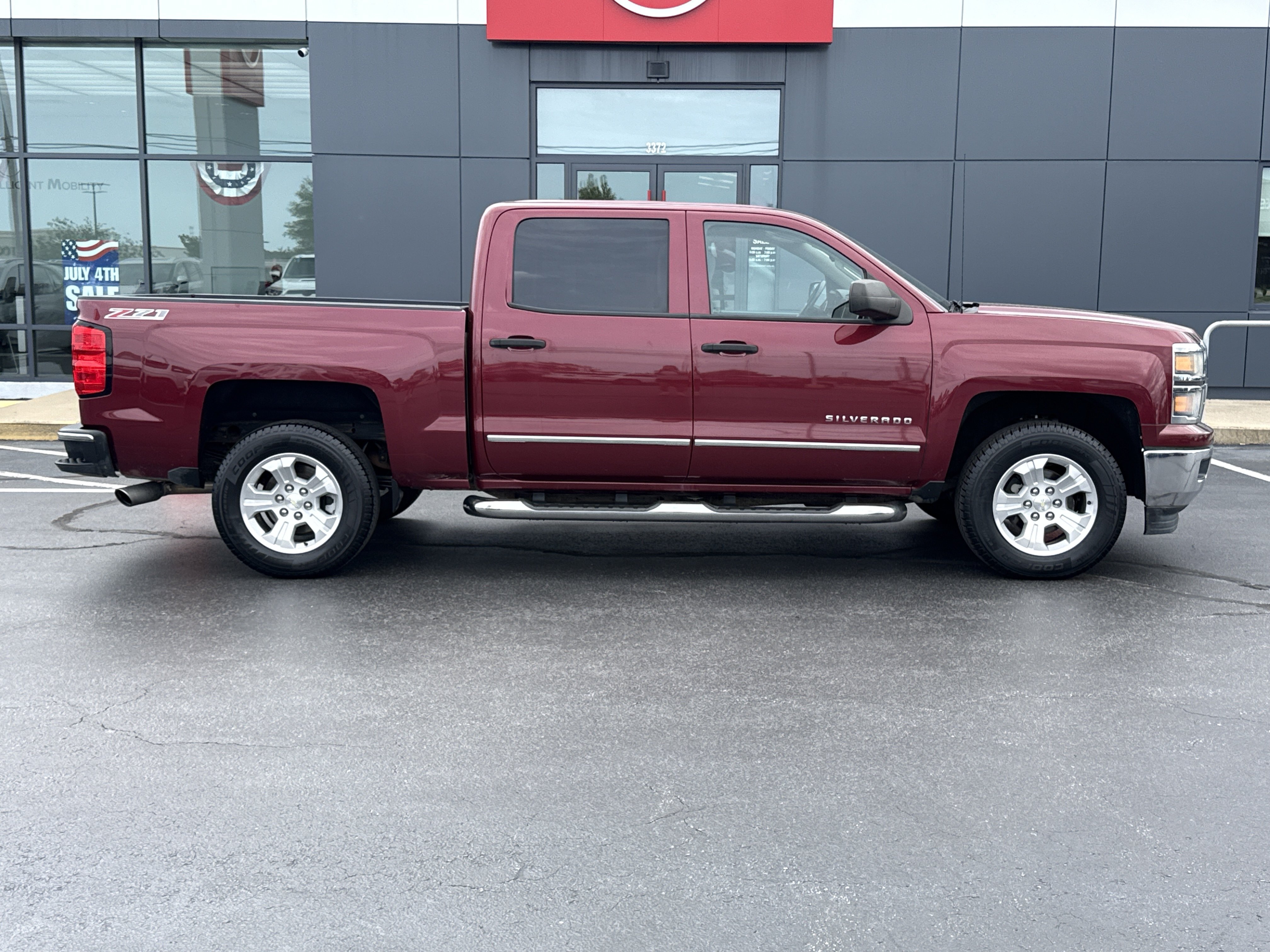 Used 2014 Deep Ruby Metallic Chevrolet LT 4WD image 2