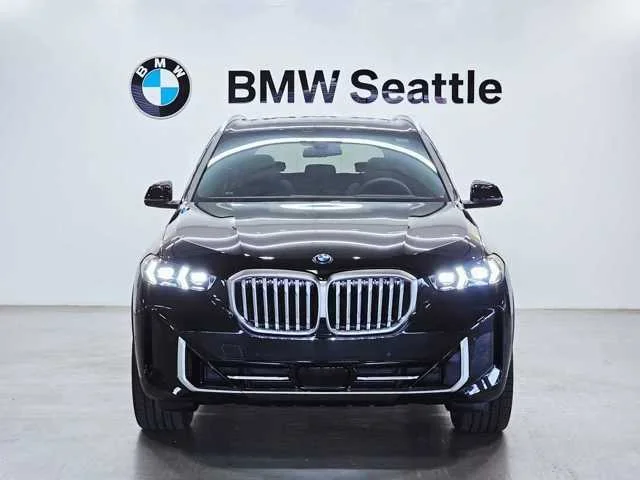 Used 2025 Black Sapphire Metallic BMW xDrive50e image 6