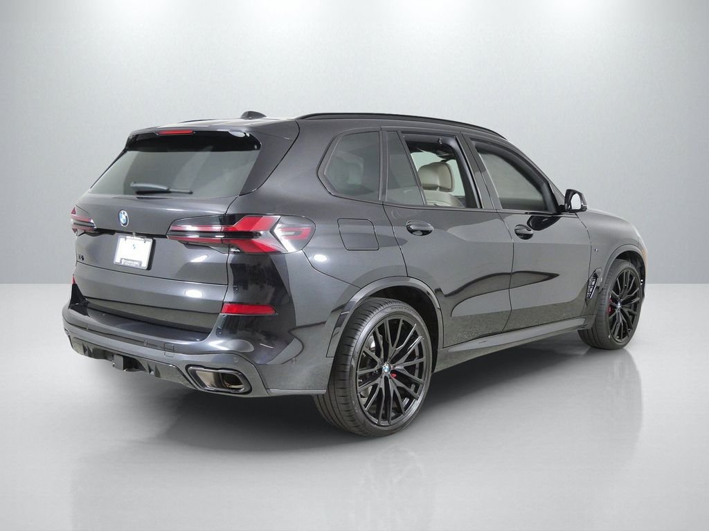 Certified Used 2025 Black Sapphire Metallic BMW xDrive40i image 11
