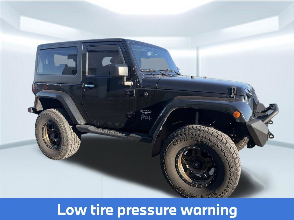 Used 2015 Black Clearcoat Jeep Sahara image 5