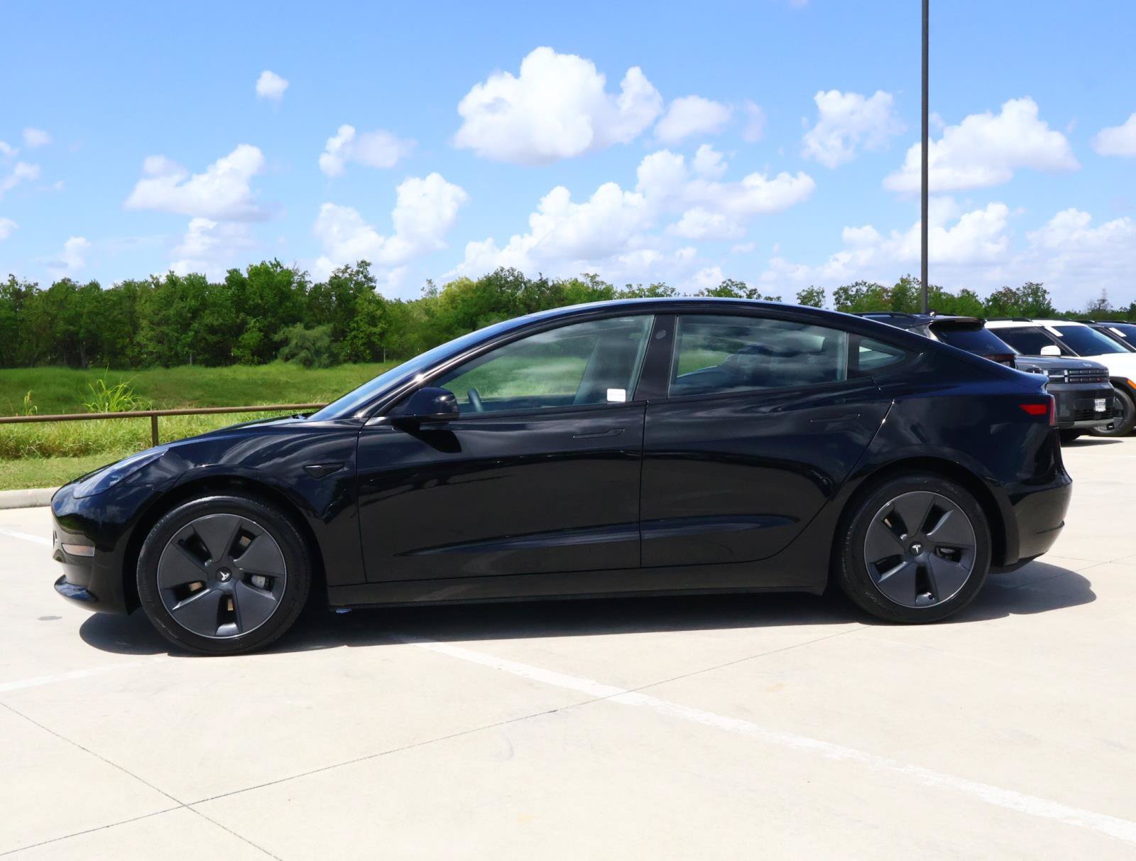 Used 2023 Tesla Model 3 Base with VIN 5YJ3E1EAXPF625779 for sale in Friendswood, TX