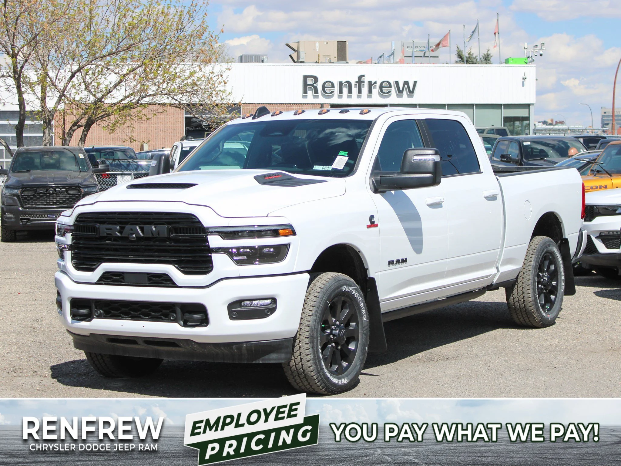 New 2026 White RAM Laramie* image 1