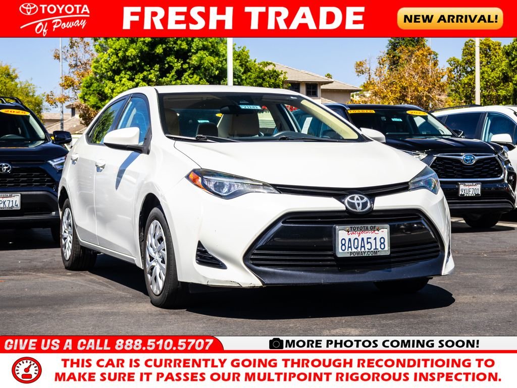 Used 2017 White Toyota LE image 1