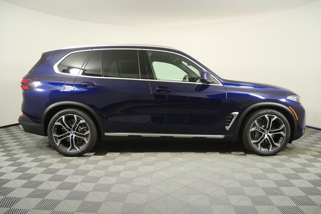 New 2026 Tanzanite Blue II Metallic BMW xDrive50e image 2