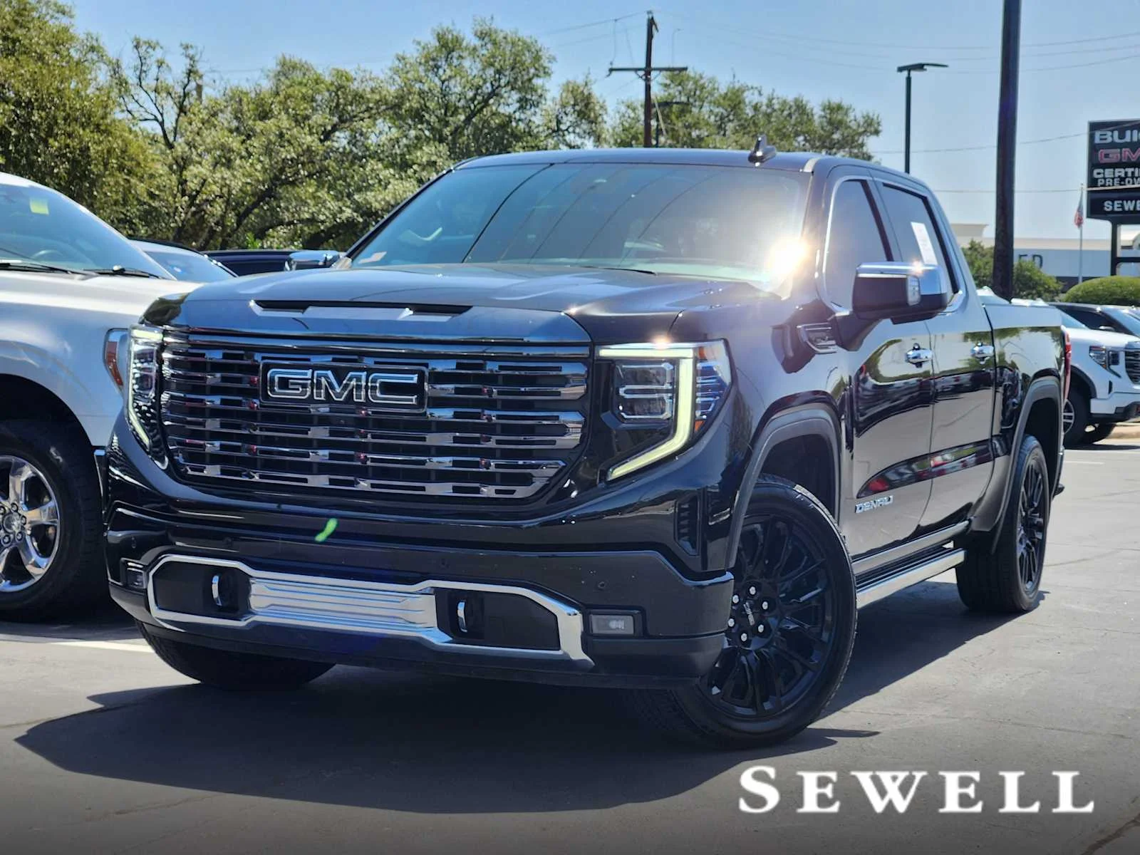 Used 2023 ONYX BLACK GMC Denali Ultimate image 1