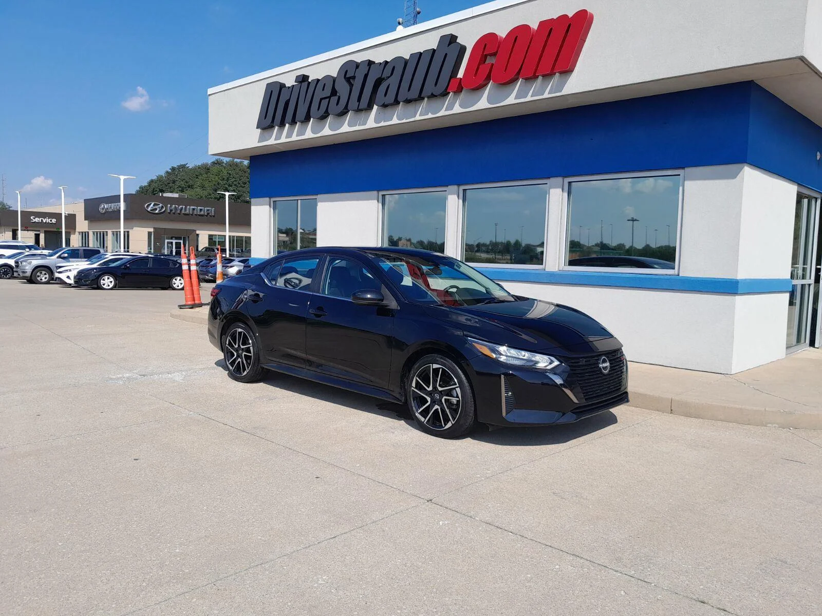 Used 2025 Super Black Nissan SR image 2