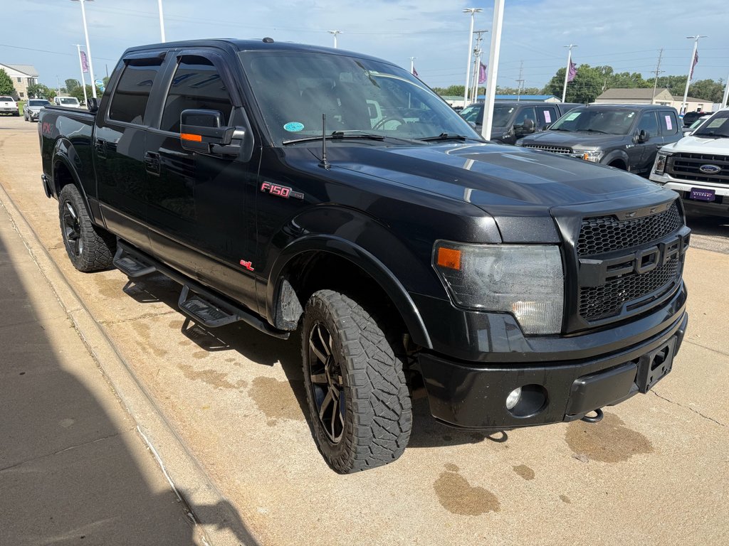 Used 2013 Tuxedo Black Metallic Ford FX4 image 4