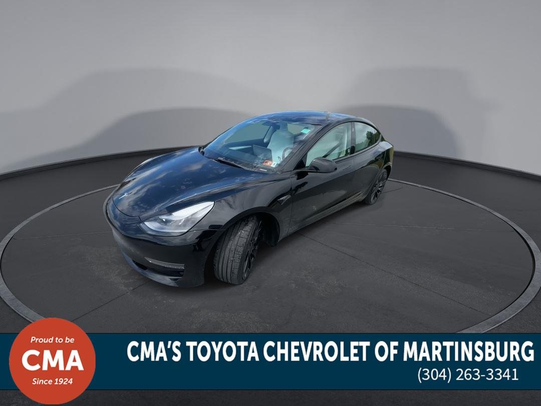 Used 2022 Solid Black Tesla Performance image 4