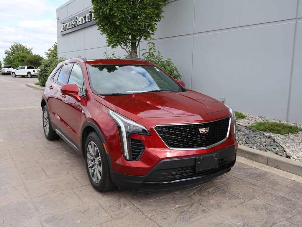 Used 2020 Red Cadillac Sport image 1