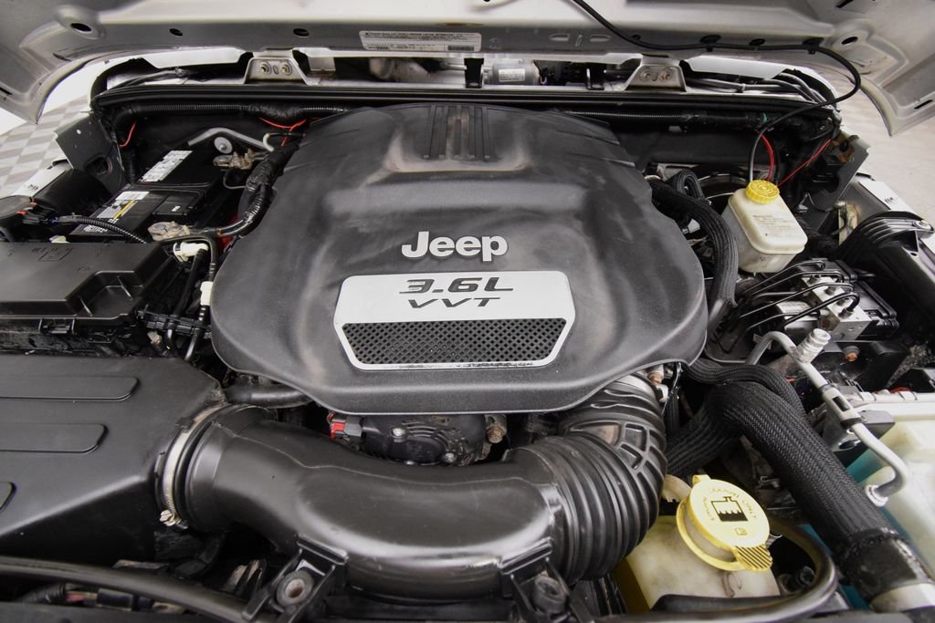Used 2012 Bright Silver Metallic Clearcoat Jeep Sport image 19