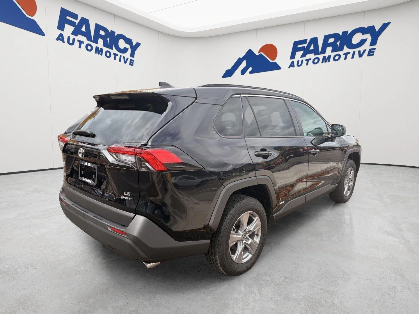 Used 2025 Midnight Black Metallic Toyota Hybrid LE image 5