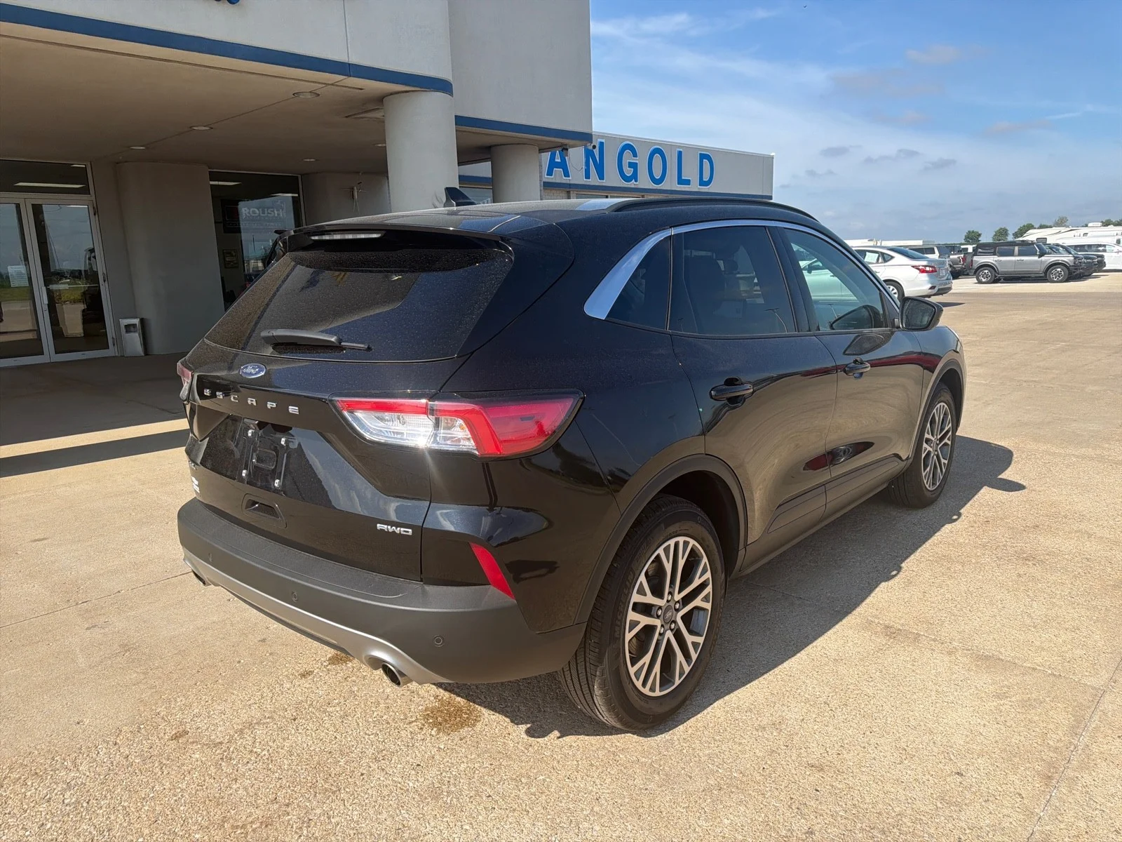 Used 2022 Agate Black Metallic Ford SEL image 7