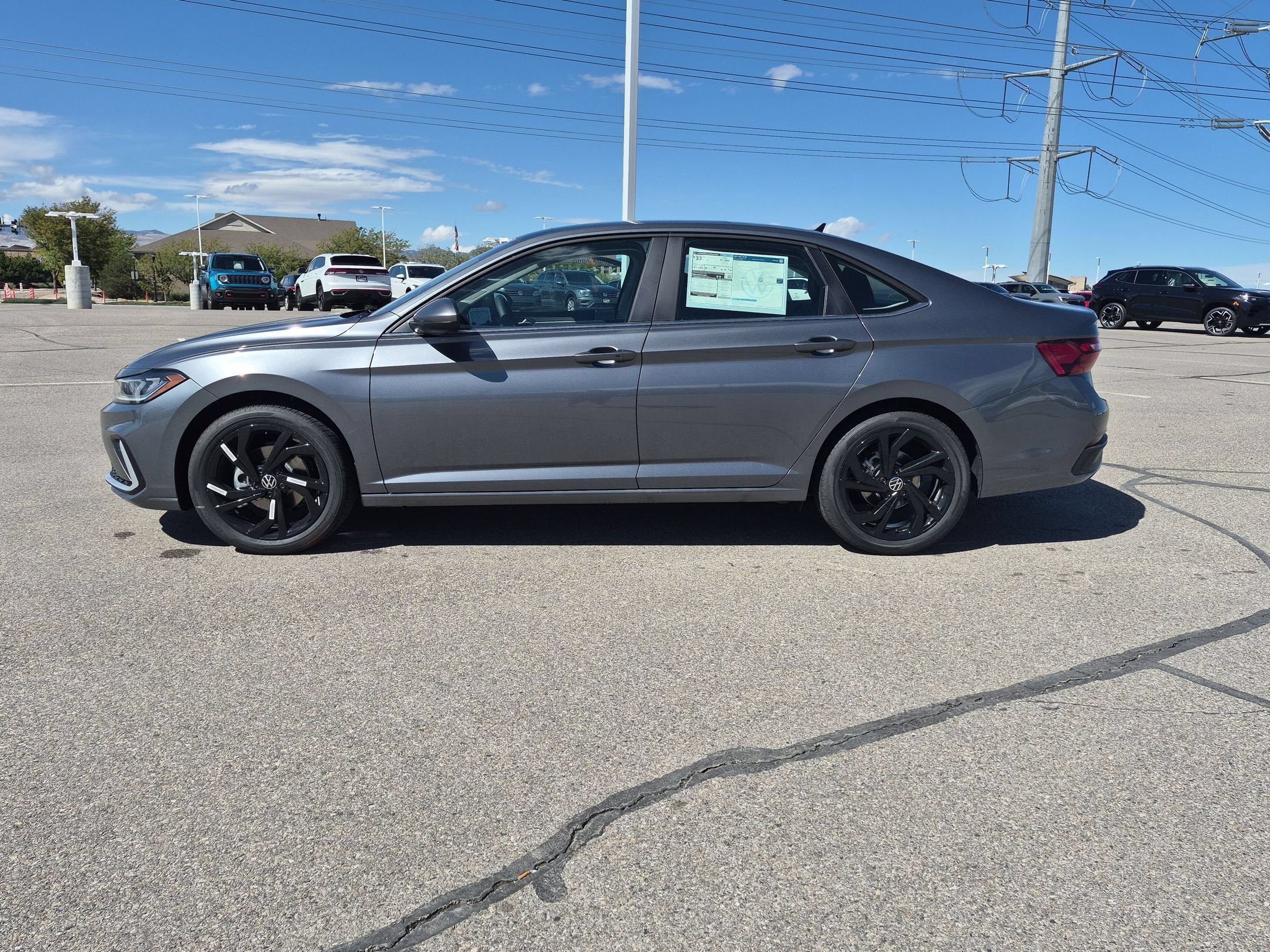 New 2027 Platinum Gray Metallic Volkswagen SE image 7