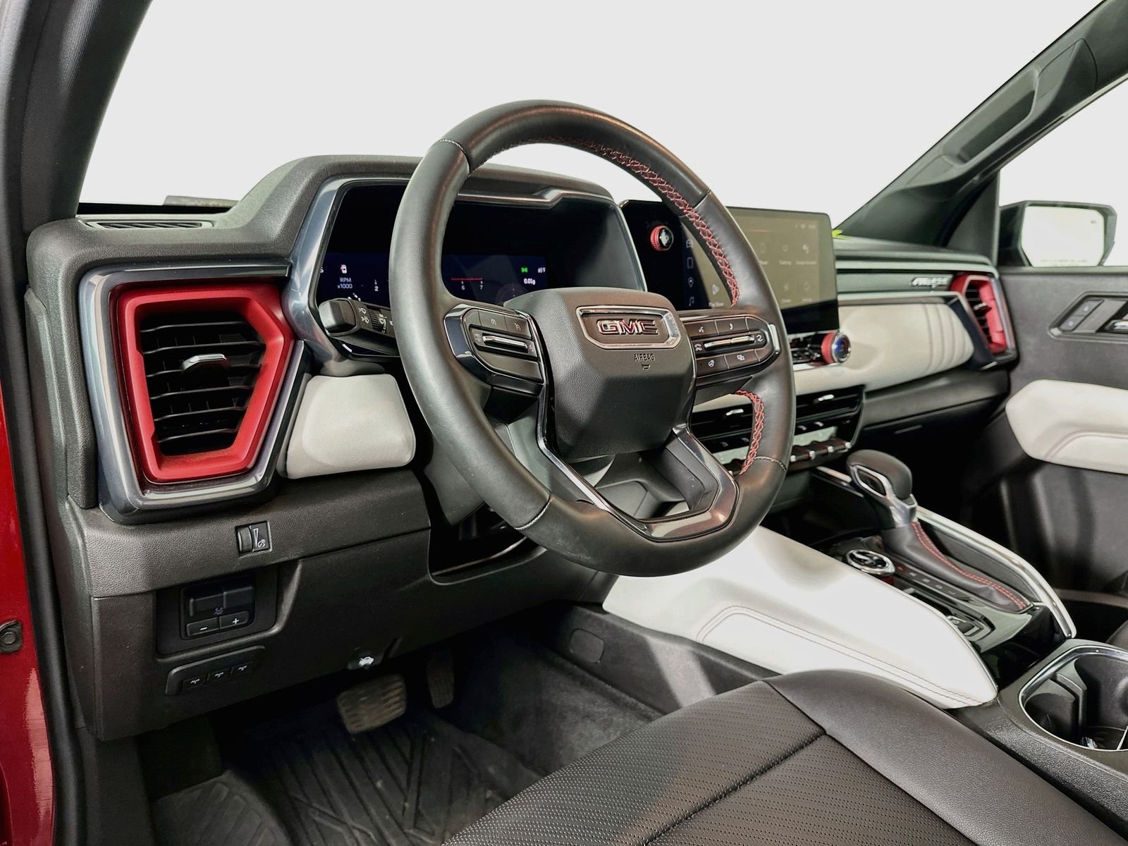 Used 2023 Volcanic Red Tintcoat GMC AT4X image 9