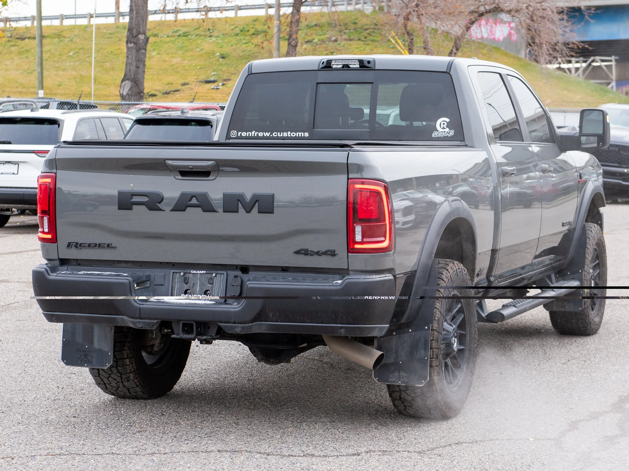 Used 2026 Grey RAM Rebel* Crew Cab 4x4, 2 Inch Lift, 35 Inch Tires, Winch, Trigger Industries MudFlaps image 7