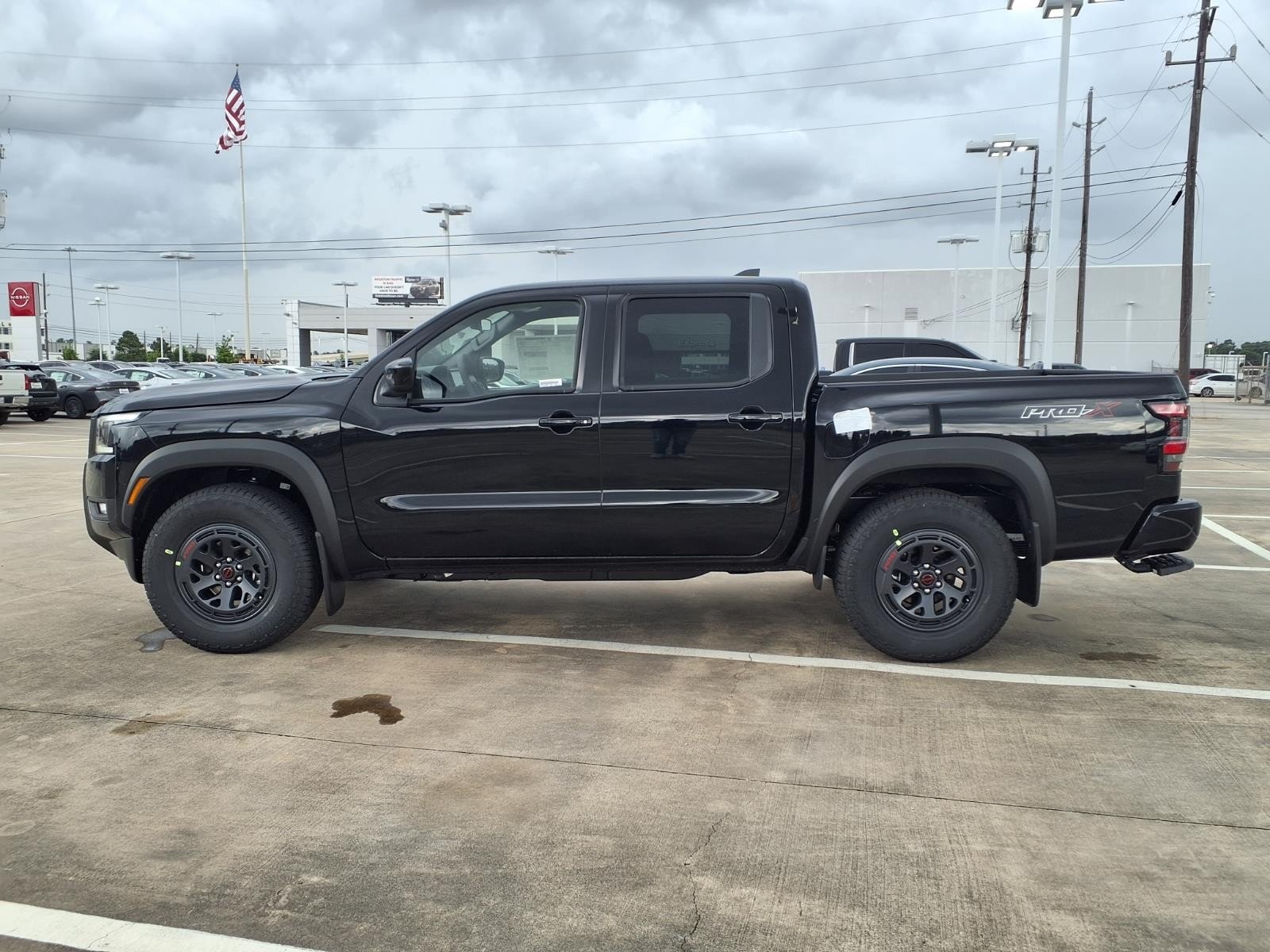 New 2026 Super Black Nissan Crew Cab PRO-X® image 8