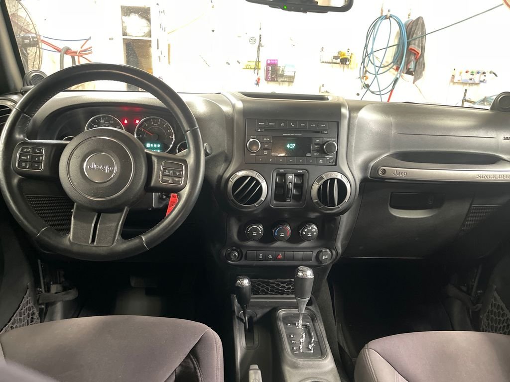 Used 2013 Black Jeep Unlimited Sport image 18