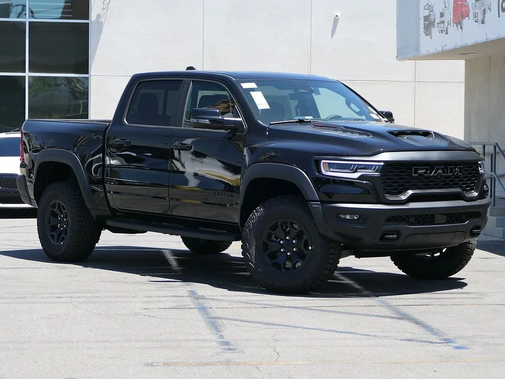 New 2026 Diamond Black Crystal Pearl Coat RAM RHO Crew Cab 4x4 5