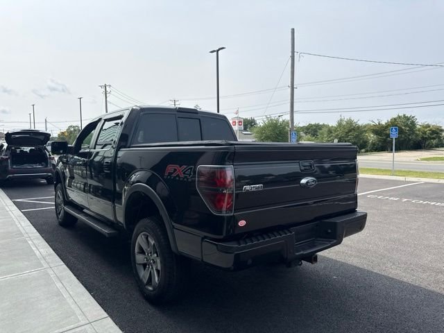 Used 2013 Black Ford FX4 image 4