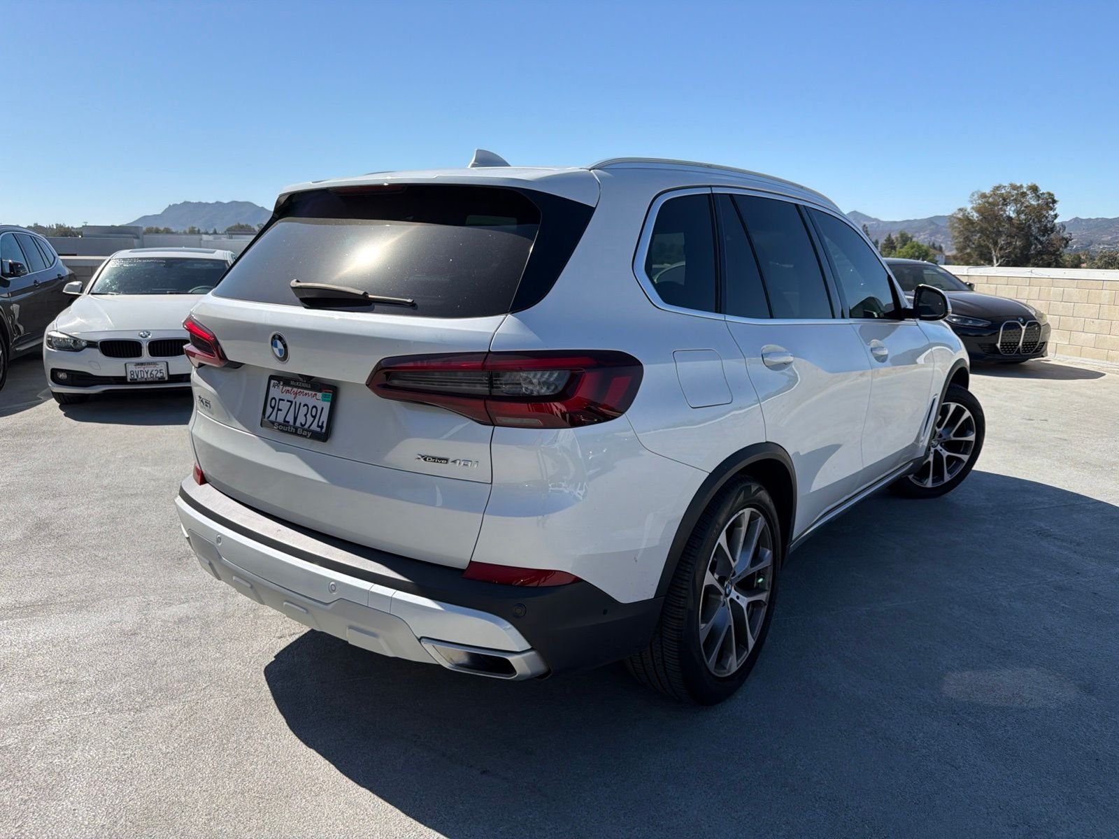 Certified Used 2023 Mineral White Metallic BMW xDrive40i image 4