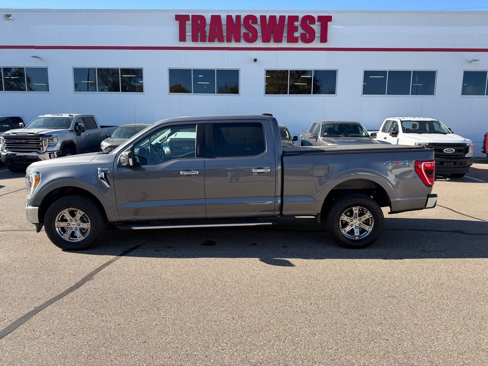 Used 2021 Ford F-150 XLT with VIN 1FTFW1E81MFA70476 for sale in Minneapolis, Minnesota