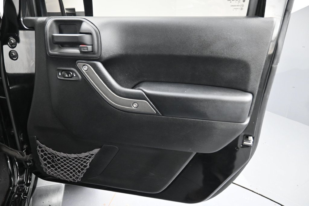 Used 2014 Black Clearcoat Jeep Unlimited Sport image 17