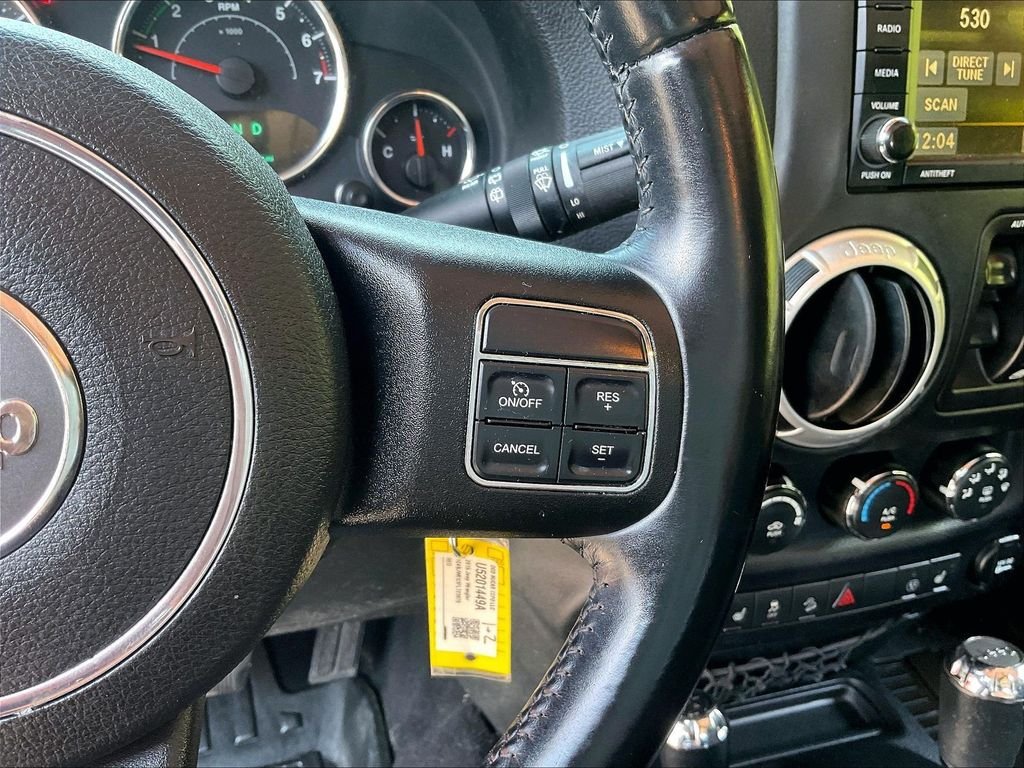 Used 2015 Red Jeep Unlimited Sahara image 23