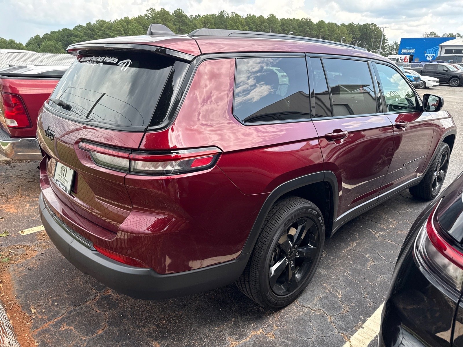 Used 2025 Velvet Red Pearl Coat Jeep Altitude X image 2