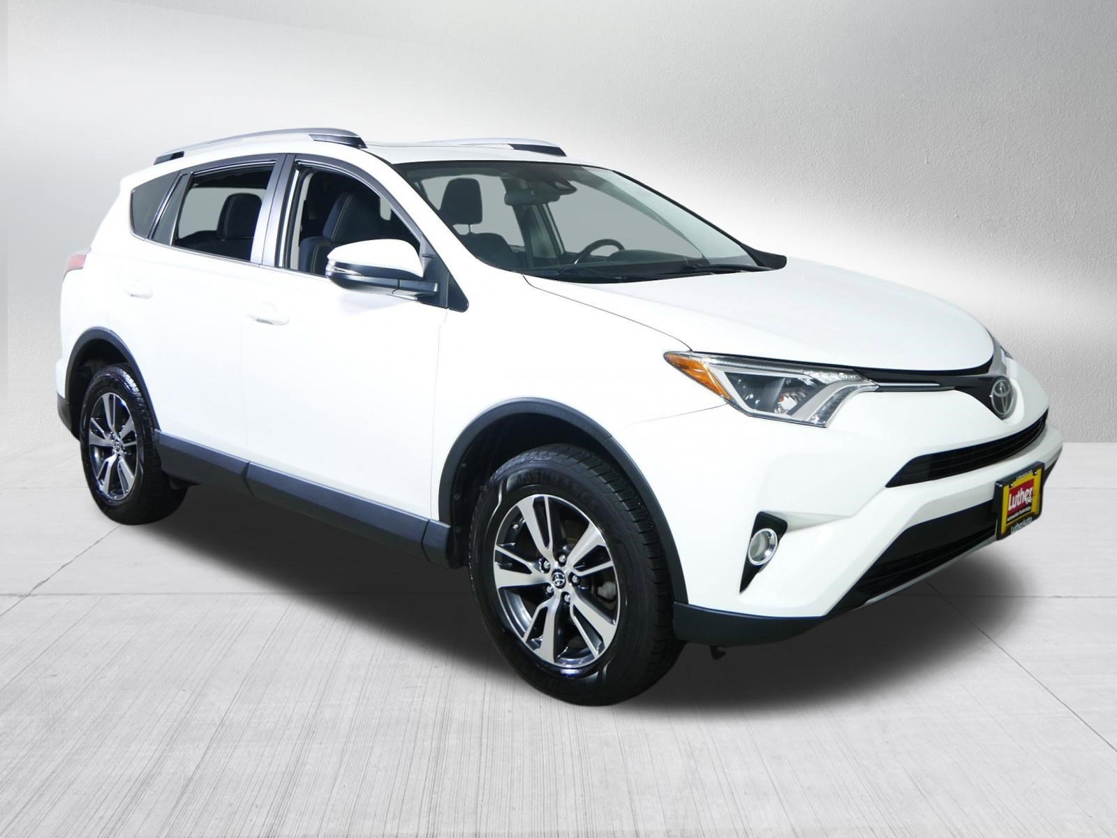 Used 2018 Super White Toyota XLE image 1