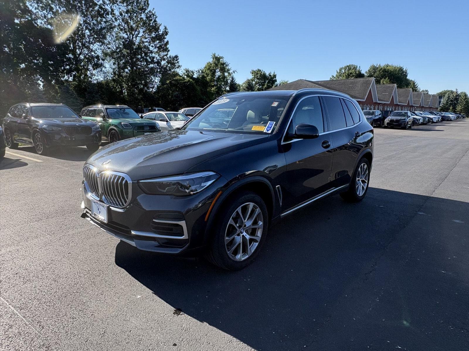 Certified Used 2023 Dark Graphite Metallic BMW xDrive40i image 4