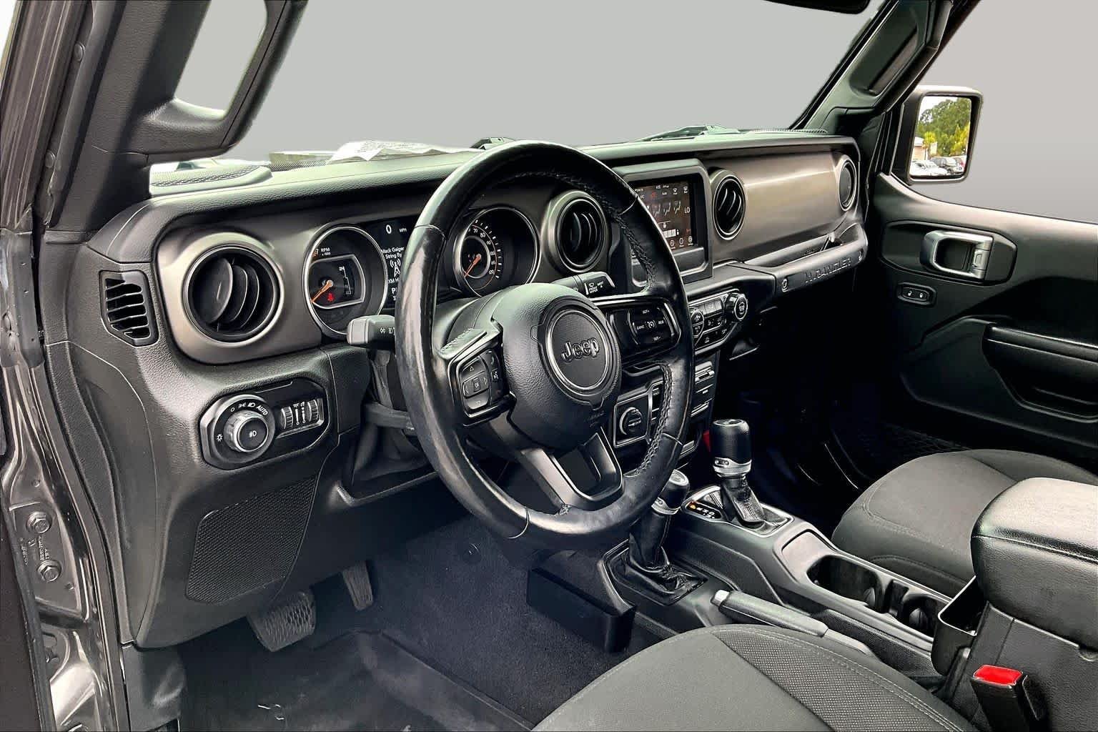 Used 2021 Granite Crystal Metallic Clearcoat Jeep Unlimited Sport S image 16