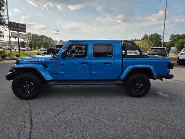 Used 2024 Blue Jeep Sport image 4