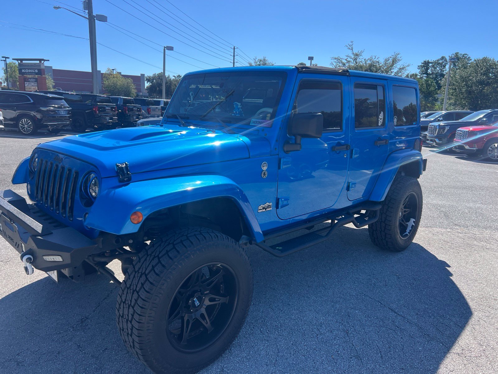 Used 2014 Blue Jeep Unlimited Polar Edition image 1