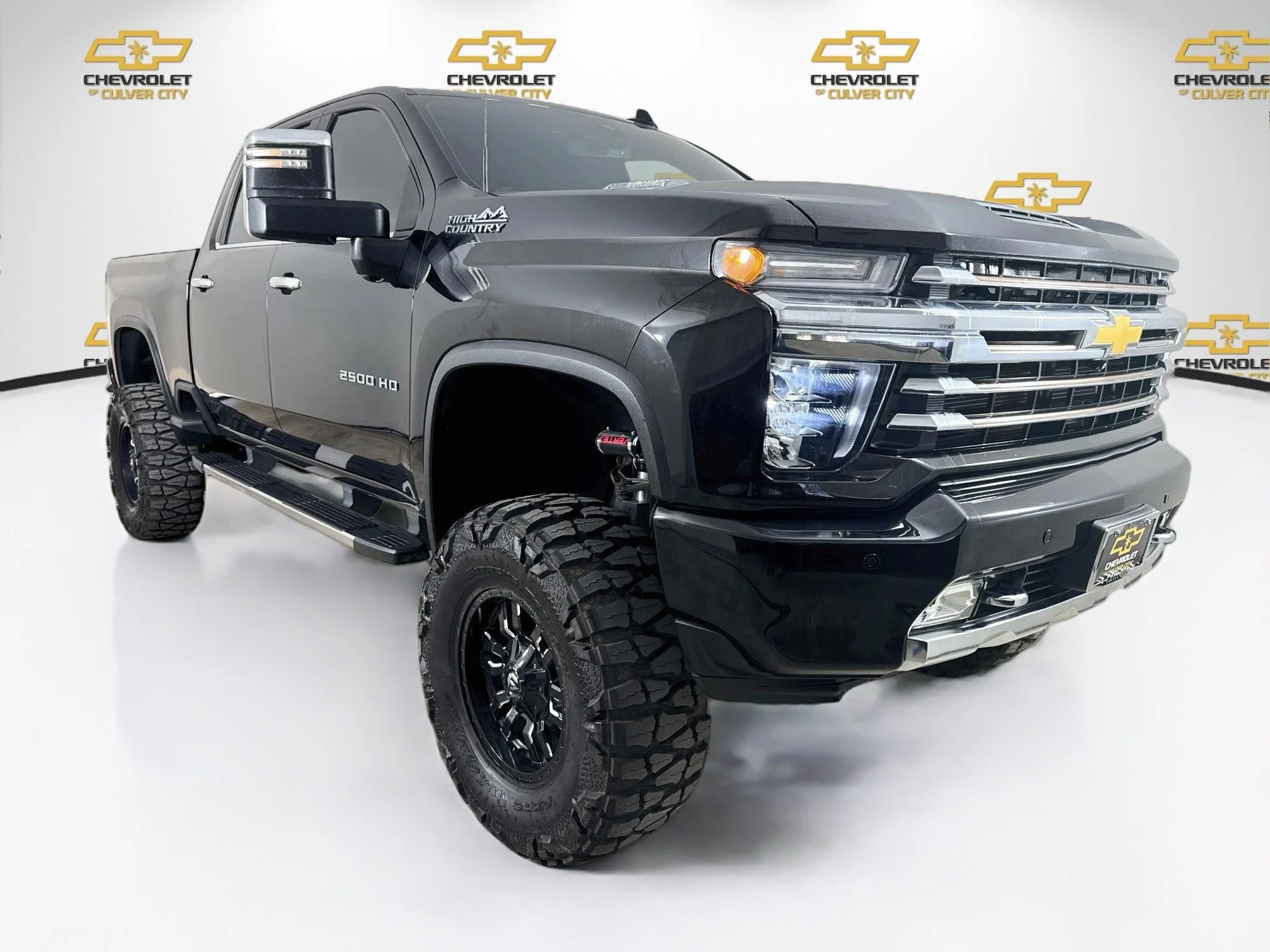 Used 2022 MOSAIC BLACK METALLIC Chevrolet High Country image 1
