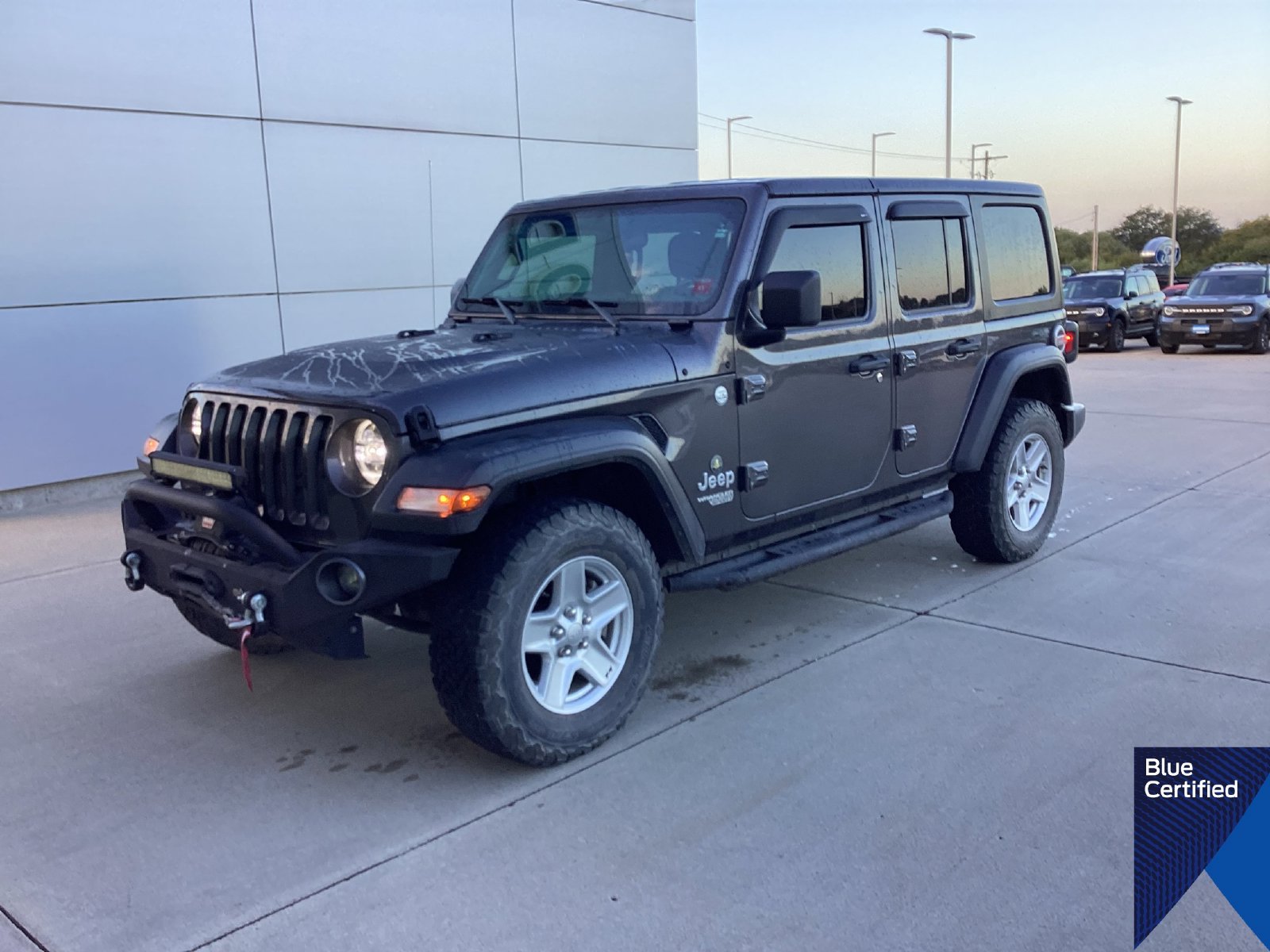 Certified Used 2021 Granite Crystal Clearcoat Metallic Jeep Unlimited Sport S image 1